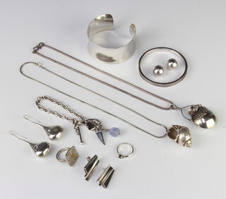 A silver bangle and minor silver jewellery 187 grams 