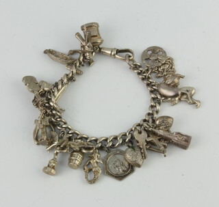 A silver charm bracelet 71 grams