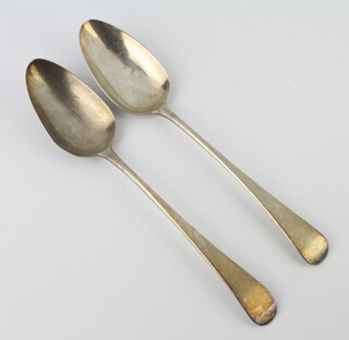 A George III Old English table spoon London 1801 and a George IV ditto 1821, 120 grams