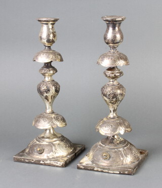 A pair of Continental repousse silver plated baluster candlesticks 30cm 