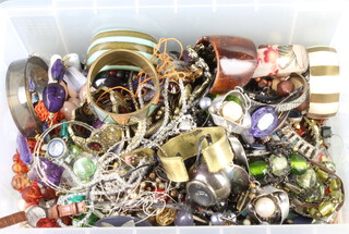 A large quantity of costume jewellery and watches 