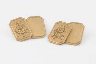 A pair of 9ct yellow gold engine turned and monogram cufflinks, 8.4 grams 