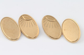 A pair of 9ct yellow gold engine turned cufflinks 5.9 grams 