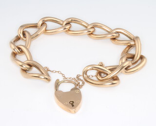 A 9ct yellow gold hollow link curb bracelet, 23.6 grams