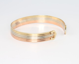 A 9ct 3 colour gold torque bangle, 12.3 grams