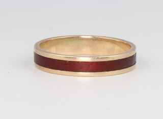 A 9ct yellow gold enamelled band, size N, 2.2 grams