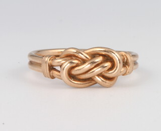 A 9ct rose gold knot ring, size P, 3.8 grams