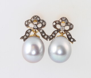 A pair of silver gilt grey cultured pearl and diamond earrings 
