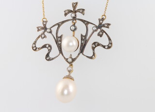 An Edwardian style silver gilt cultured pearl, diamond and seed pearl pendant