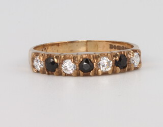 A 9ct yellow gold gem set half eternity ring size M, 1.9 grams