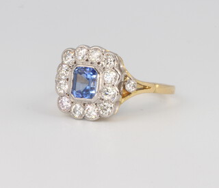 An 18ct yellow gold Art Deco style sapphire and diamond cluster ring, the centre stone approx. 0.75ct, brilliant cut diamonds approx. 0.9ct, size N 1/2