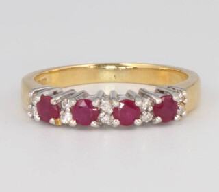 An 18ct yellow gold ruby and diamond ring, size M, 4.2 grams