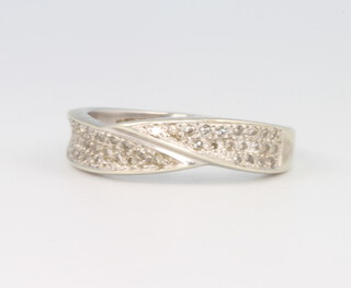 A 9ct white gold diamond twist ring, size P, 3.6 grams 