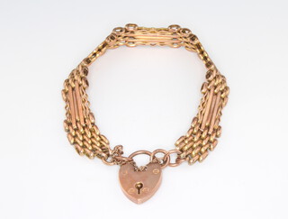 A 9ct rose gold gatelink bracelet with padlock, 14.3 grams 
