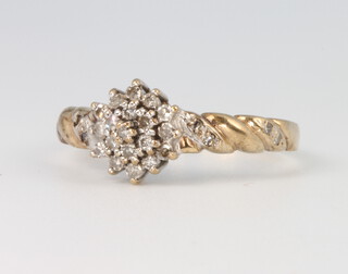 A 9ct yellow gold diamond cluster ring size P, 2.4 grams