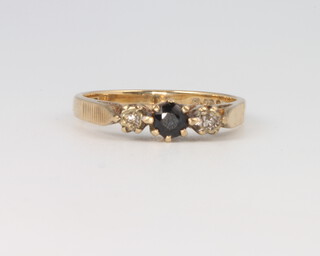 A 9ct yellow gold sapphire and diamond 3 stone ring size L, 1.9 grams 