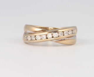 A 9ct yellow gold channel set diamond ring size I 1/2, 2.5 grams 