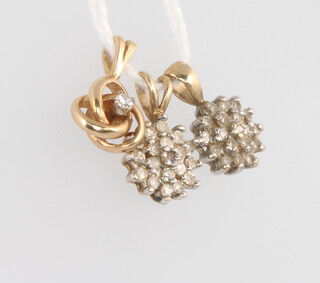 Three 9ct yellow gold diamond pendants 2.3 grams 