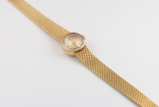 Rolex, a lady's 18ct yellow gold Rolex wristwatch on a ditto bracelet, case numbered 1772079, gross weight 27 grams 
