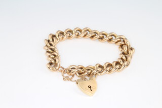 A 9ct yellow gold hollow link bracelet and padlock 20.5 grams 
