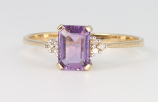 A 9ct yellow gold amethyst and diamond ring size P, 1.4 grams