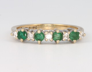 A 9ct yellow gold emerald and diamond half hoop ring size M, 2 grams