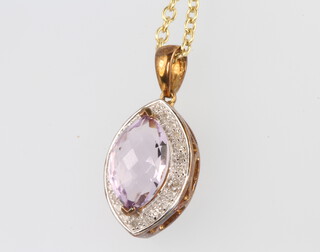 A 9ct yellow gold amethyst and diamond pendant on a ditto 44cm chain, 6.3 grams gross