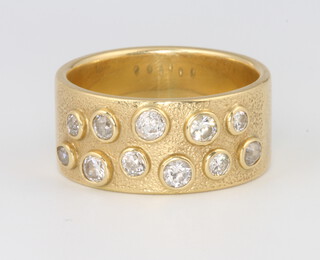 A gentleman's 18ct yellow gold textured 11 stone diamond ring, approx 1.5ct, 28.5 grams, size 4 