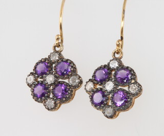 A pair of silver gilt, amethyst and diamond cluster earrings 