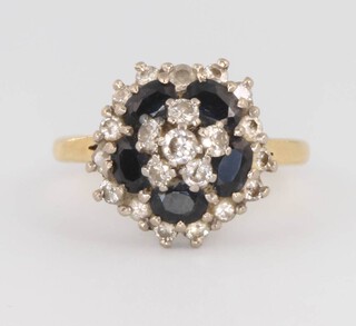 An 18ct yellow gold sapphire and diamond cluster ring, size P, 7.8 grams