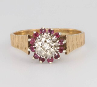 A 9ct ruby and diamond cluster ring size S, 3.5 grams