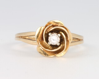 A 14ct yellow gold diamond ring, size M, 3.1 grams