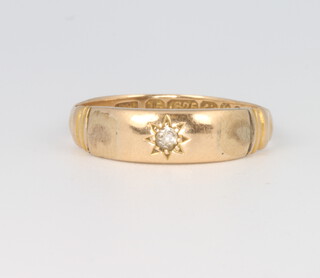 A 15ct yellow gold diamond ring, size Q, 2 grams