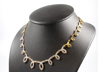 An 18ct yellow gold paste set necklace, 32.9 grams