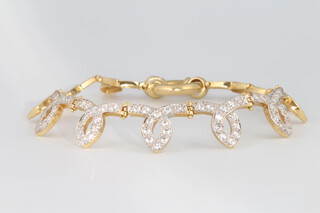 An 18ct yellow gold paste set bracelet, 18.2 grams 