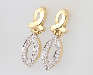 A pair of 18ct yellow gold paste set earrings 