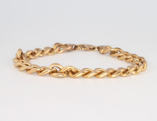 A 9ct yellow gold curb link bracelet 10.9 grams