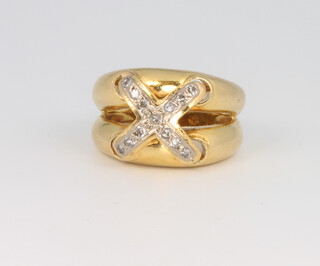 An 18ct yellow gold diamond set cross ring, size J, 10.4 grams