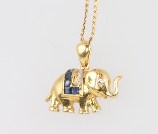An 18ct yellow gold sapphire and diamond elephant pendant on a 40cm chain, 3.6 grams