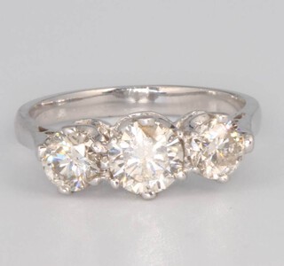 An 18ct white gold 3 stone diamond ring approx. 1.52ct, size K 1/2