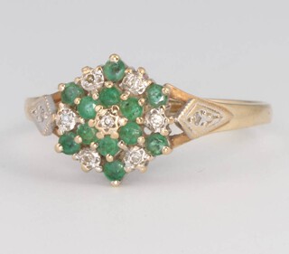 A 9ct yellow gold emerald and diamond cluster ring, size P, 2.1 grams 
