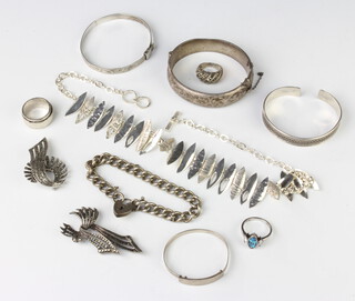 A silver bangle and minor silver jewellery, 182 grams