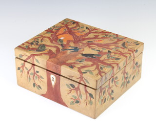 A coloured pressed leather jewellery box decorated with birds amongst trees