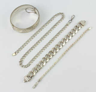 A silver engraved bangle and minor silver jewellery, 100 grams