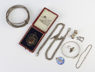 A silver sports fob and minor silver jewellery 