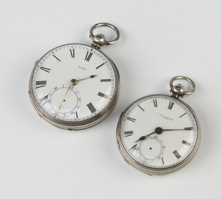 A Victorian silver key wind pocket watch with seconds at 6 o'clock, a small ditto 