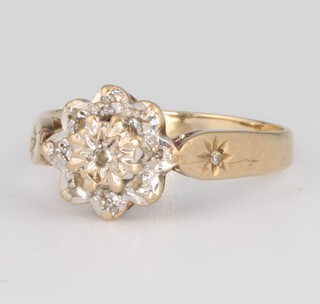 A 9ct yellow gold diamond cluster ring, size J, 1.8 grams