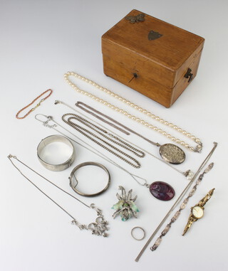 A silver bangle and minor silver jewellery, 120 grams together with costume jewellery contained in a trinket box 