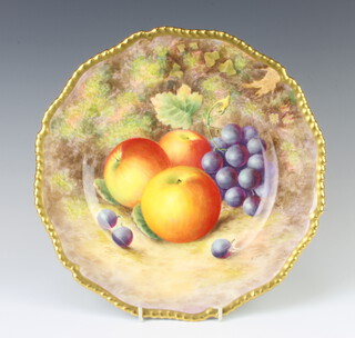 A Royal Worcester plate decorated with fruits, decorated by H Aynton 27cm 