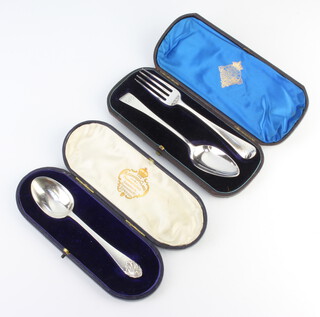A cased George III silver fork and spoon London 1805 and 1809, a ditto silver spoon Sheffield 1909, 90 grams